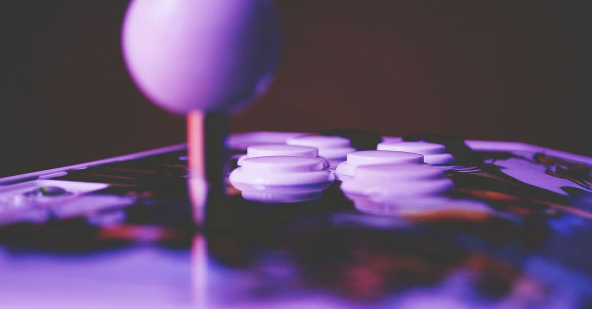 A vibrant close-up image of an arcade joystick and buttons, capturing a retro gaming mood.