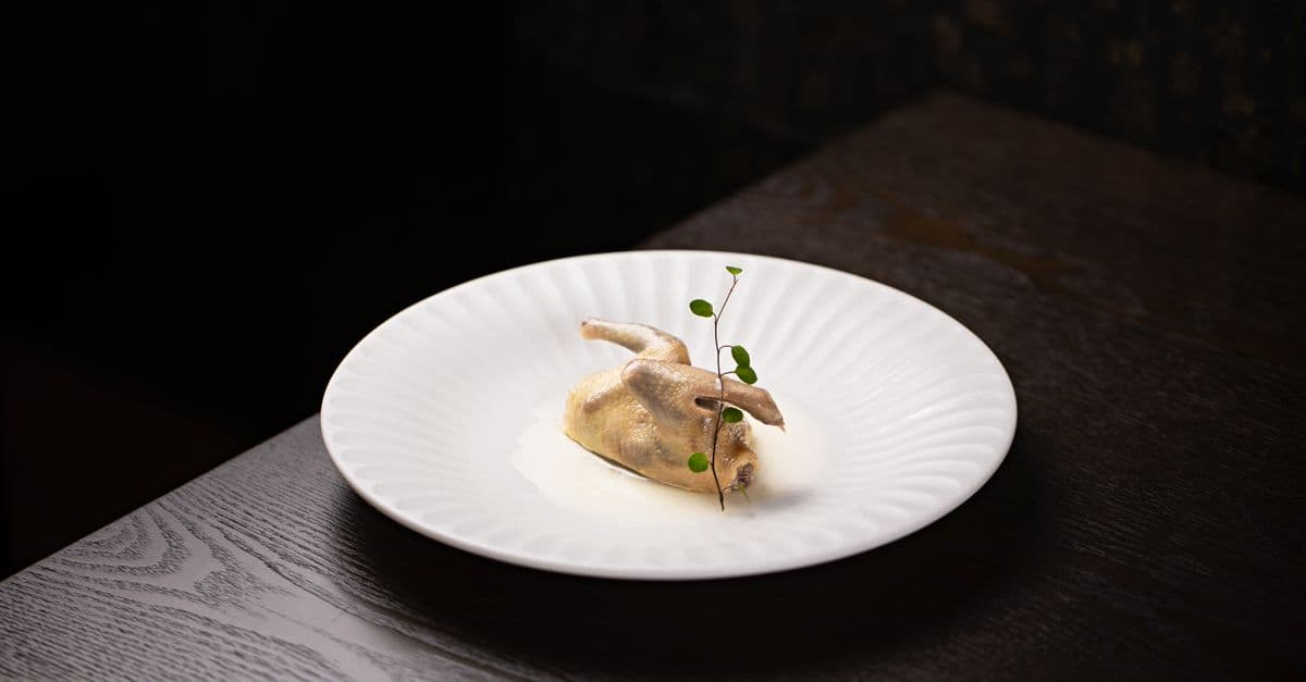 A Quail Meat on a White Plate