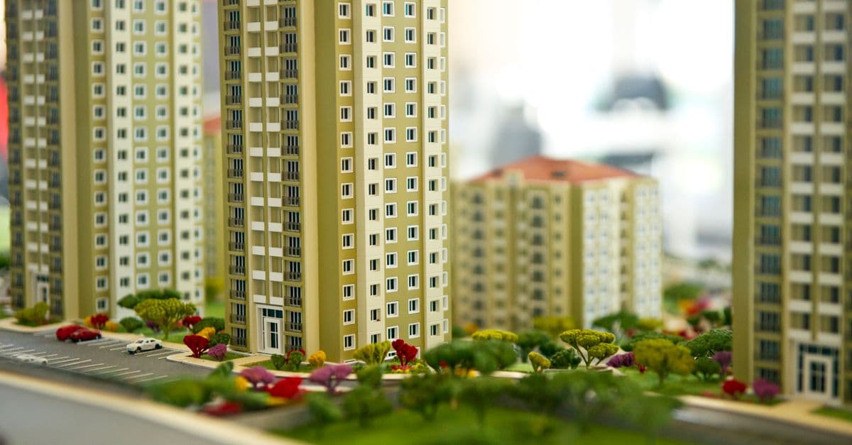 Close-up image of a modern residential building model, showcasing urban architecture.