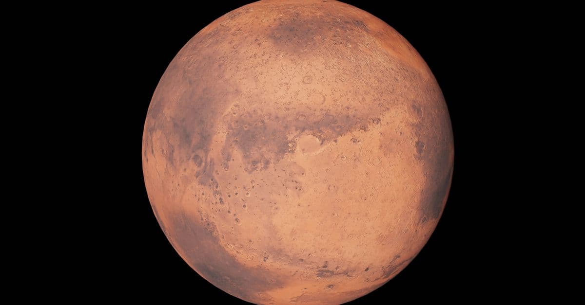 Detailed image of Mars highlighting surface features against a black space background.
