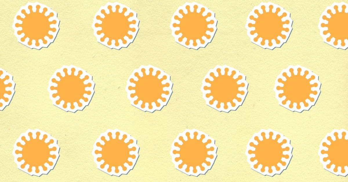 From above background of bright sphere shaped decorative cardboard illustration representing rows of cells in capsules