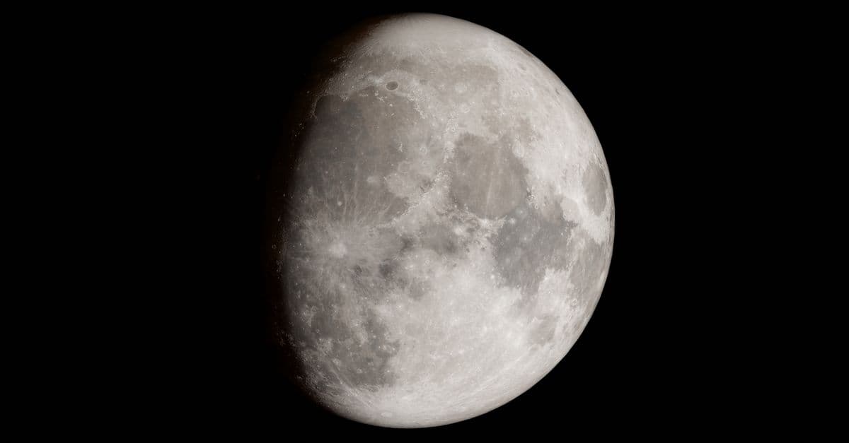 Crisp image of the moon's detailed surface against a dark background, showcasing its craters.