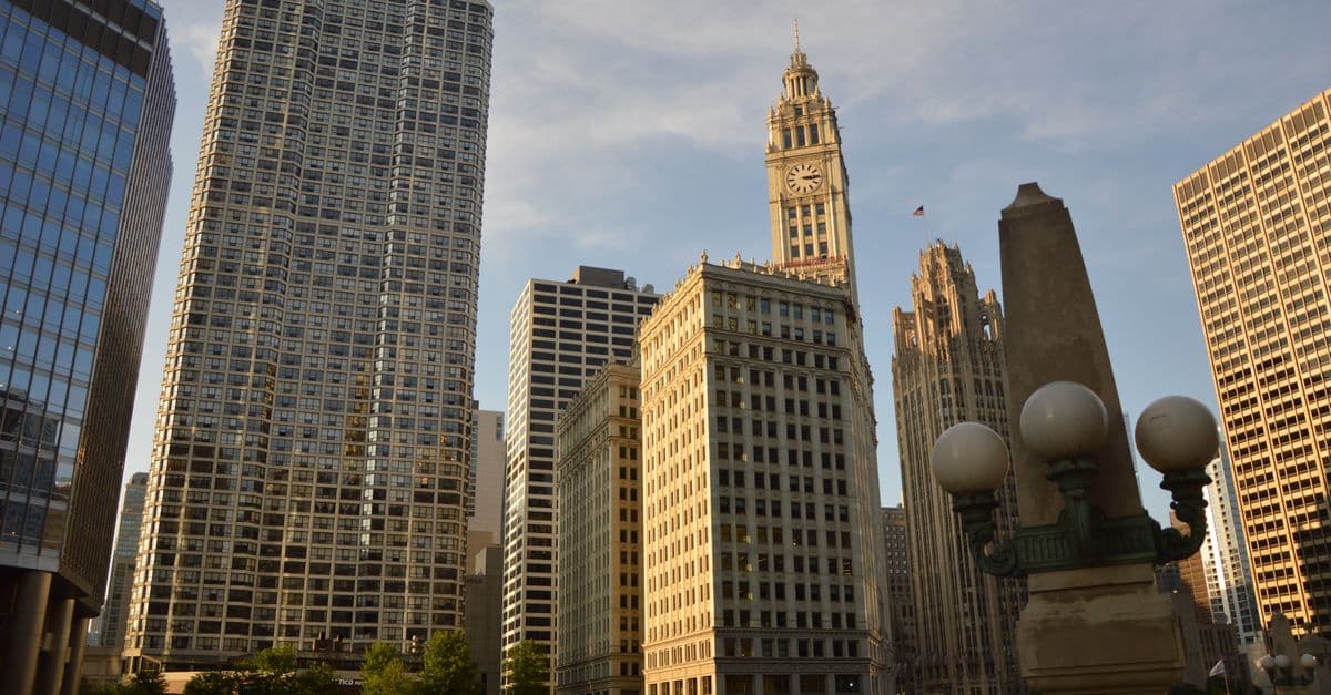 A stunning view of Chicago's skyline featuring iconic skyscrapers during sunset.
