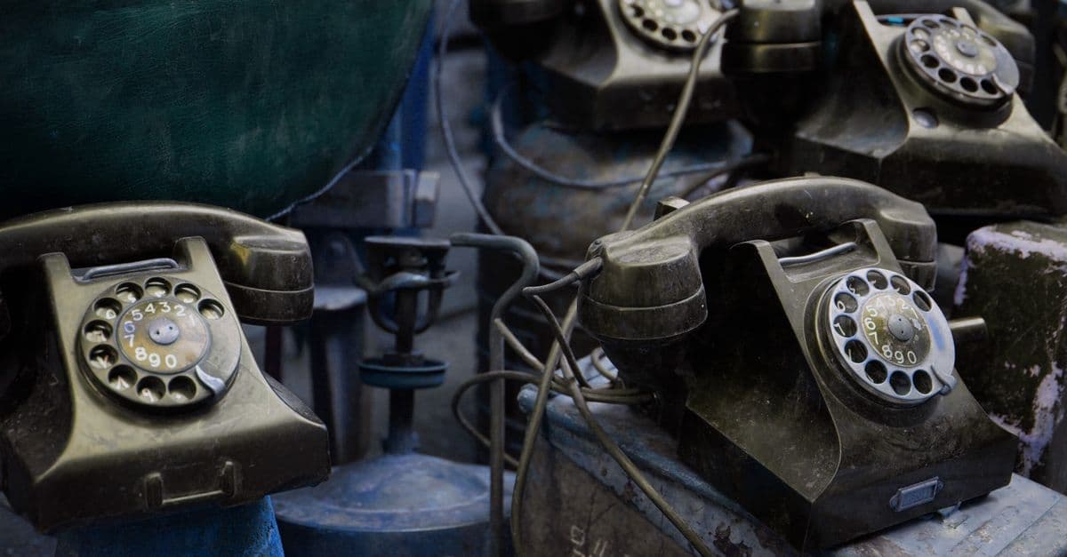 Close-up of vintage rotary telephones with a nostalgic feel, captured indoors.