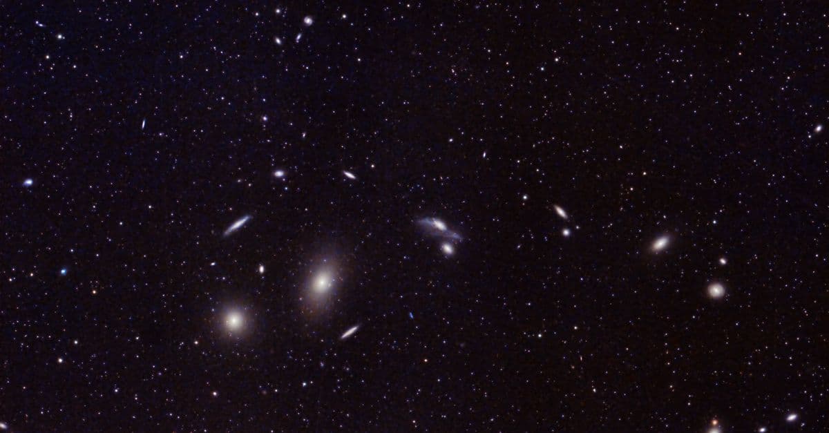 Captivating image of distant galaxies and star clusters in the vast universe. Perfect for astronomy enthusiasts.