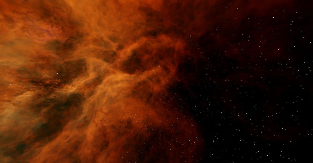 Vivid image of a celestial nebula with stars in deep space, showcasing stunning interstellar beauty.