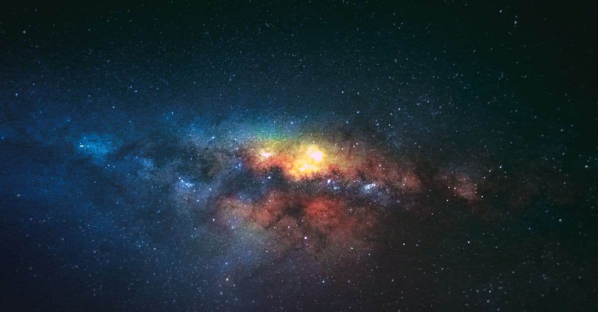Breathtaking view of milky way on starry sky with bright glowing lights in dark space against black background in universe
