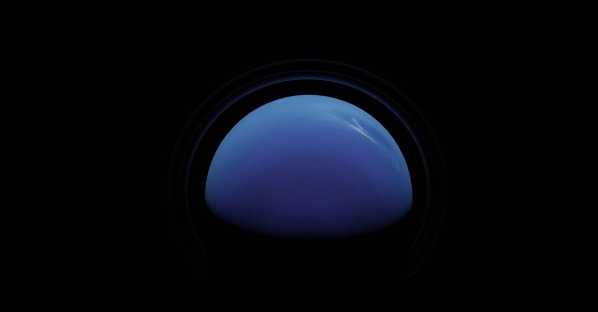 Captivating view of Neptune's deep blue hues against the black expanse of space.