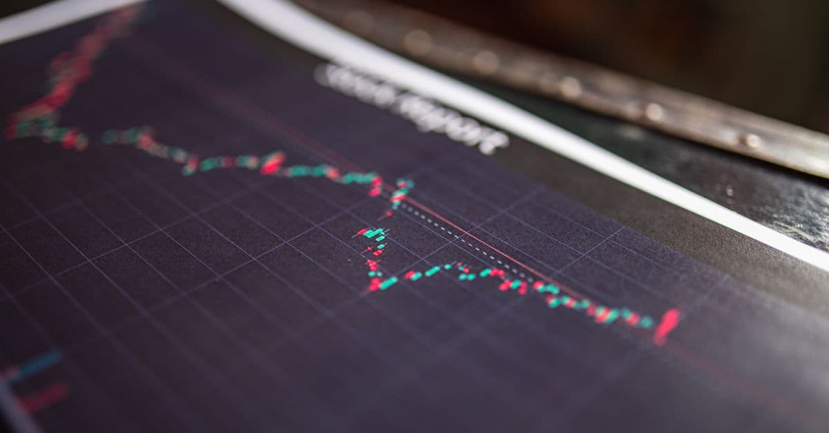 Close-up of a stock report showing a financial data graph.