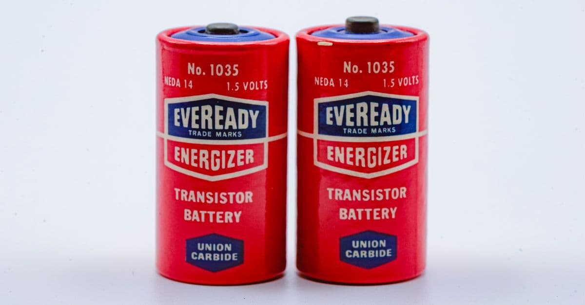 Close-up of two vintage Eveready Energizer transistor batteries on a white background.