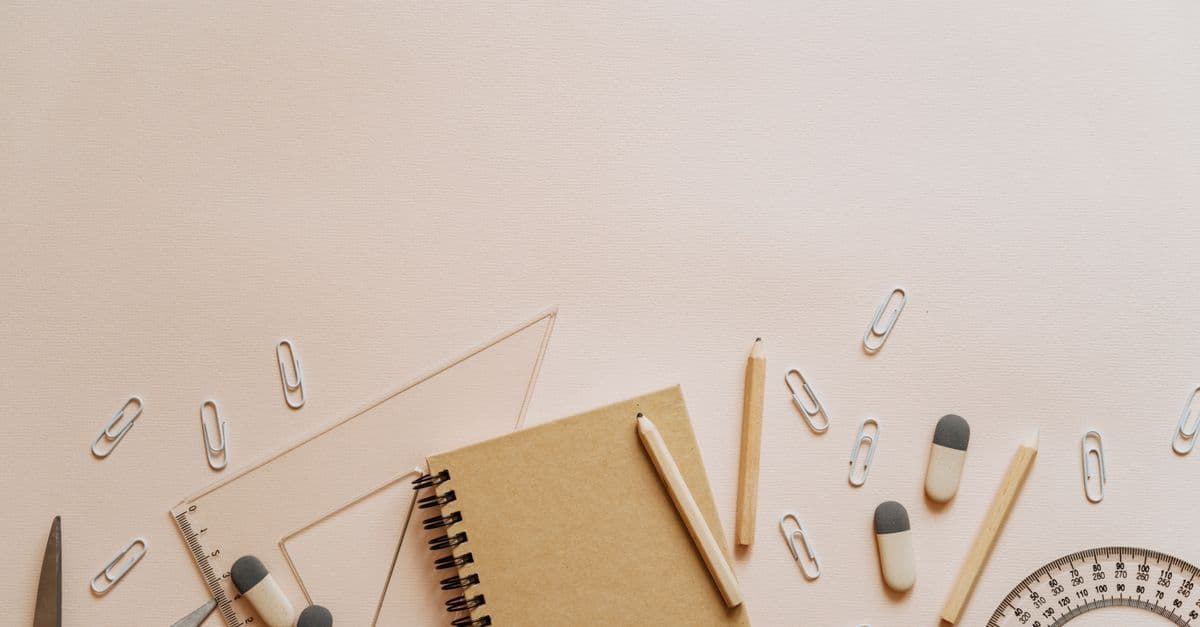 Top view of school supplies with ample copy space, perfect for educational themes.