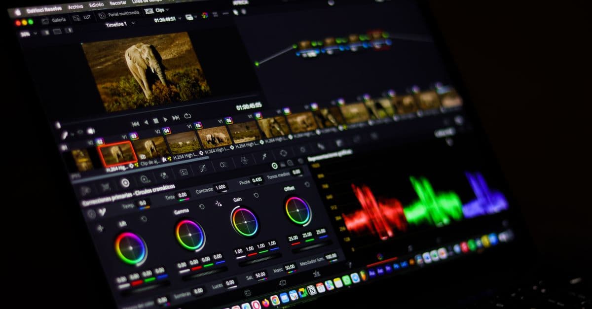 Close-up view of professional video editing software displaying colorful waveforms.