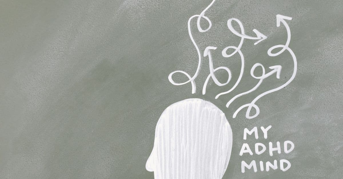 Creative depiction of the ADHD mind with chalk arrows on a green board.