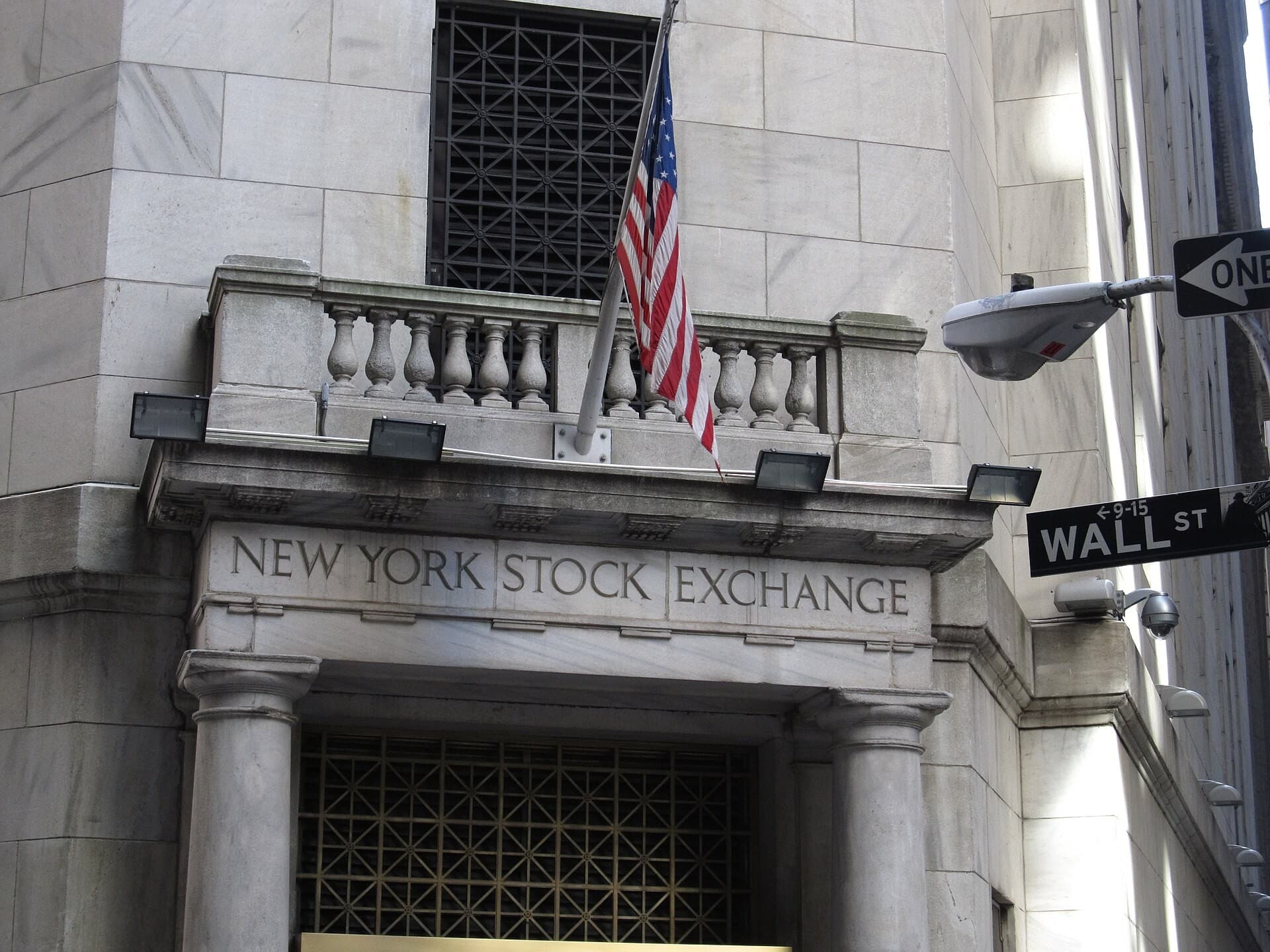 The New York Stock Exchange building on Wall Street, representing financial markets and institutions.