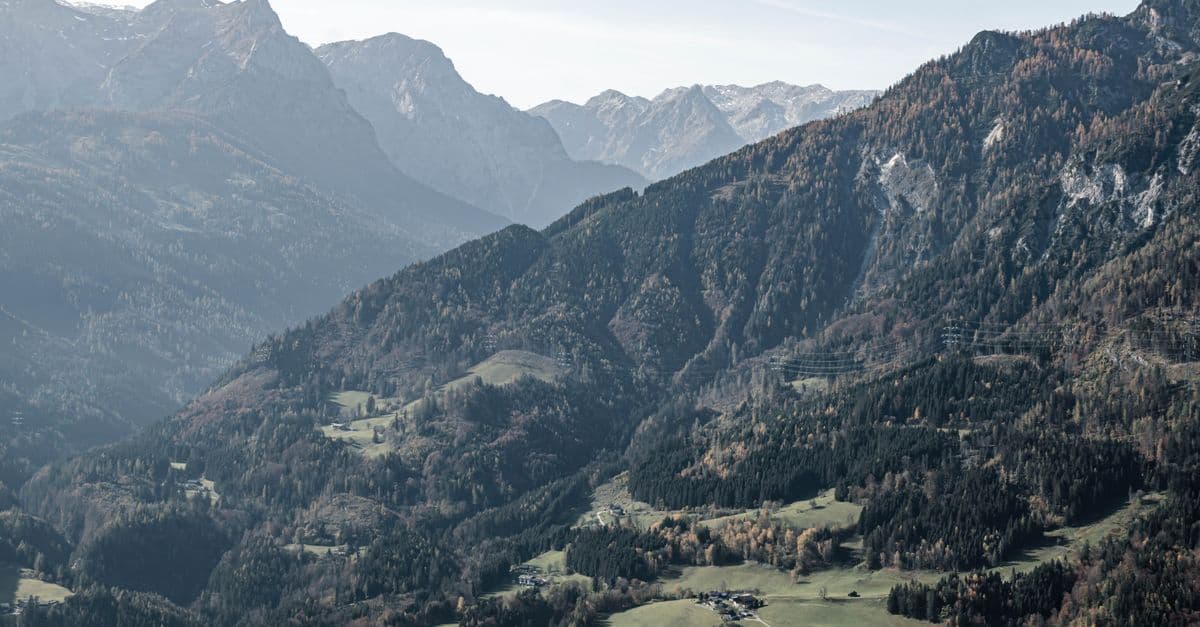 Breathtaking mountain landscape with lush valley and distant peaks, capturing the beauty of nature.