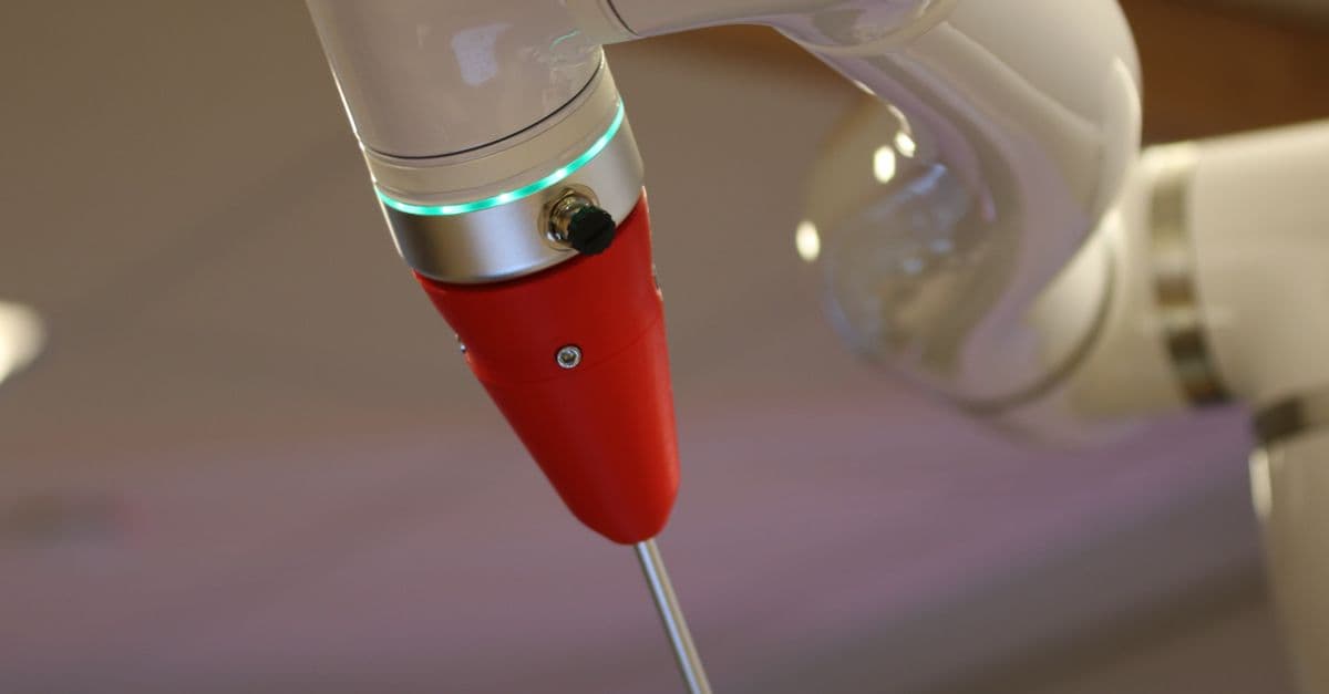 Detailed view of a cutting-edge industrial robotic arm in action.