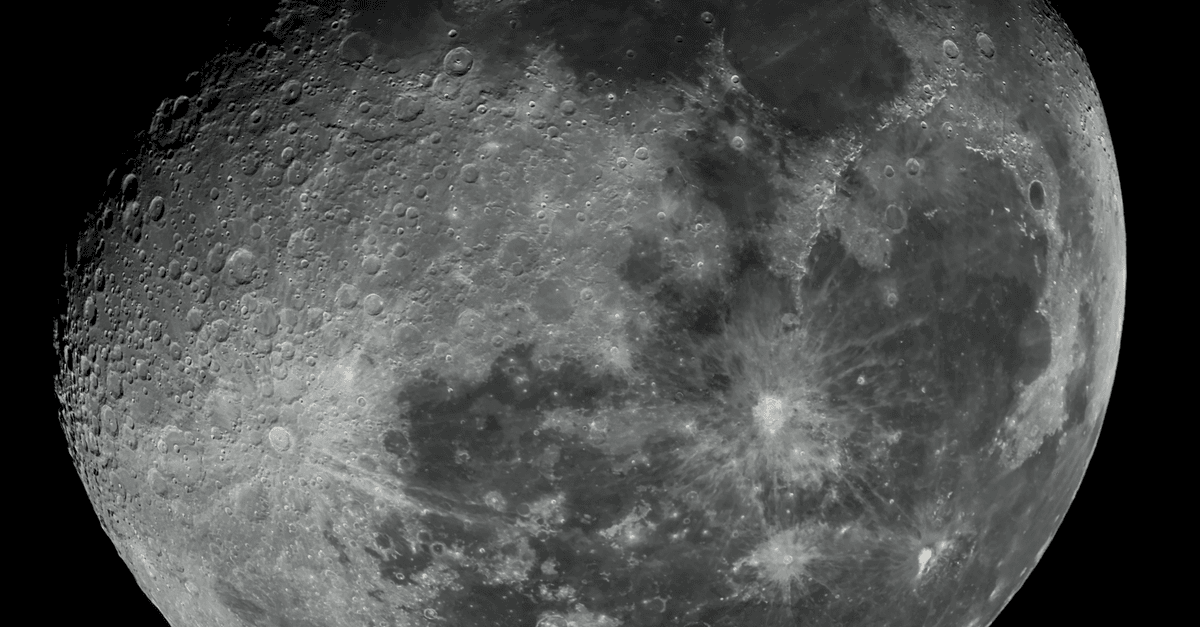 Close-up of the moon's surface showing craters and texture in stunning detail.