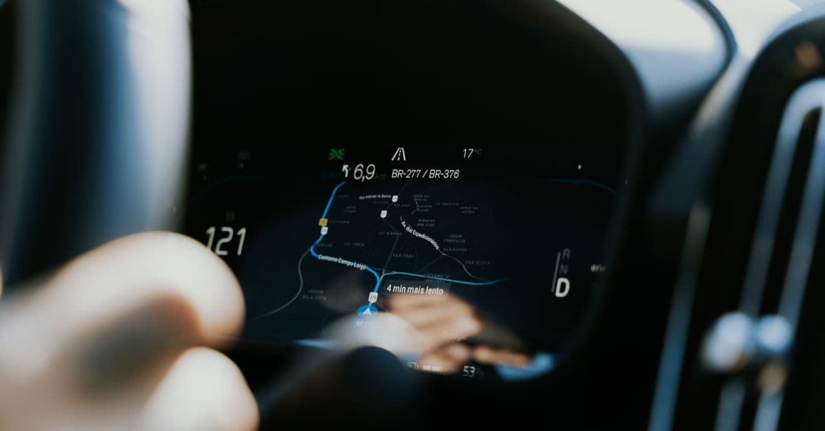 Close-up view of a car dashboard showing a GPS navigation screen in use.