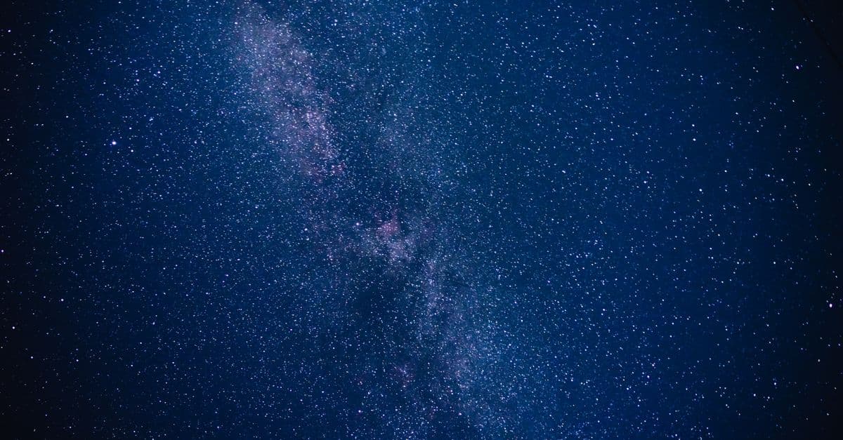 Capture the breathtaking beauty of the Milky Way galaxy with countless stars illuminating the night sky.
