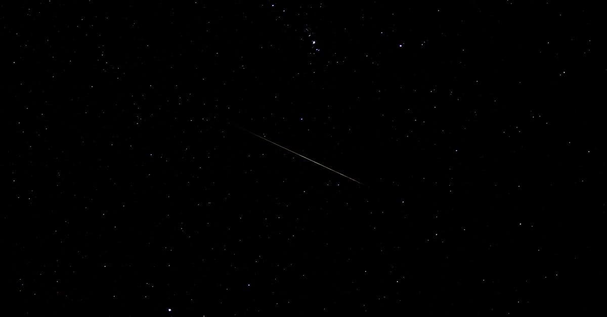 A serene view of a shooting star across a starry sky, perfect for astronomy lovers.