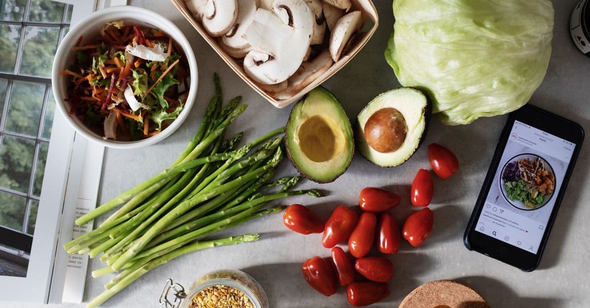 Assorted fresh vegetables and grains for a vibrant, healthy salad.