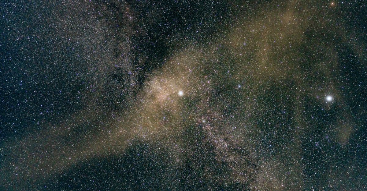 Vibrant starry sky view of the Milky Way galaxy with countless stars and cosmic dust.
