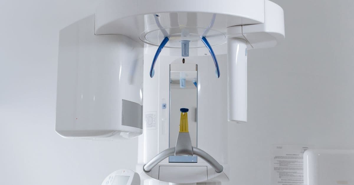 Close-up of modern dental x-ray machine in a clinic setting.