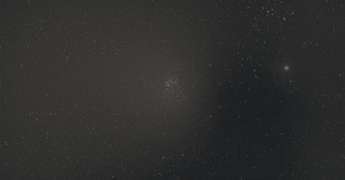 A captivating image of the Pleiades star cluster against the vast night sky.