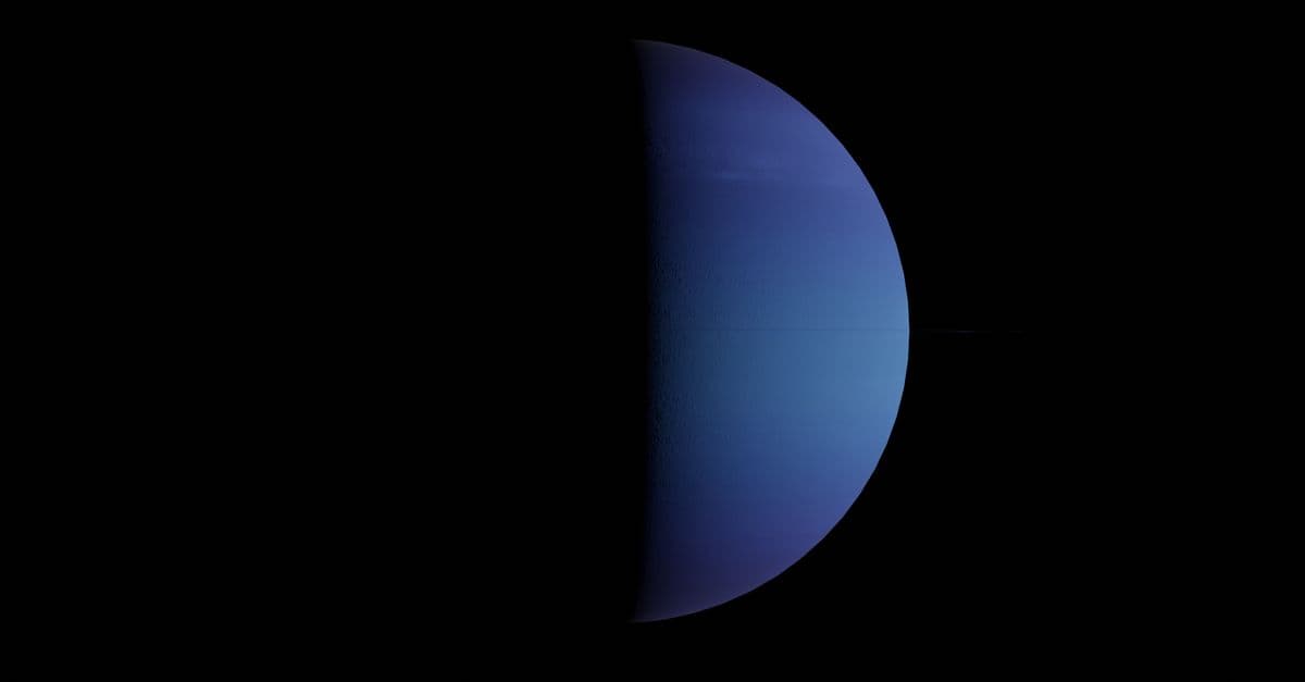 Half-lit Neptune against a black sky backdrop, showcasing its bluish hue.