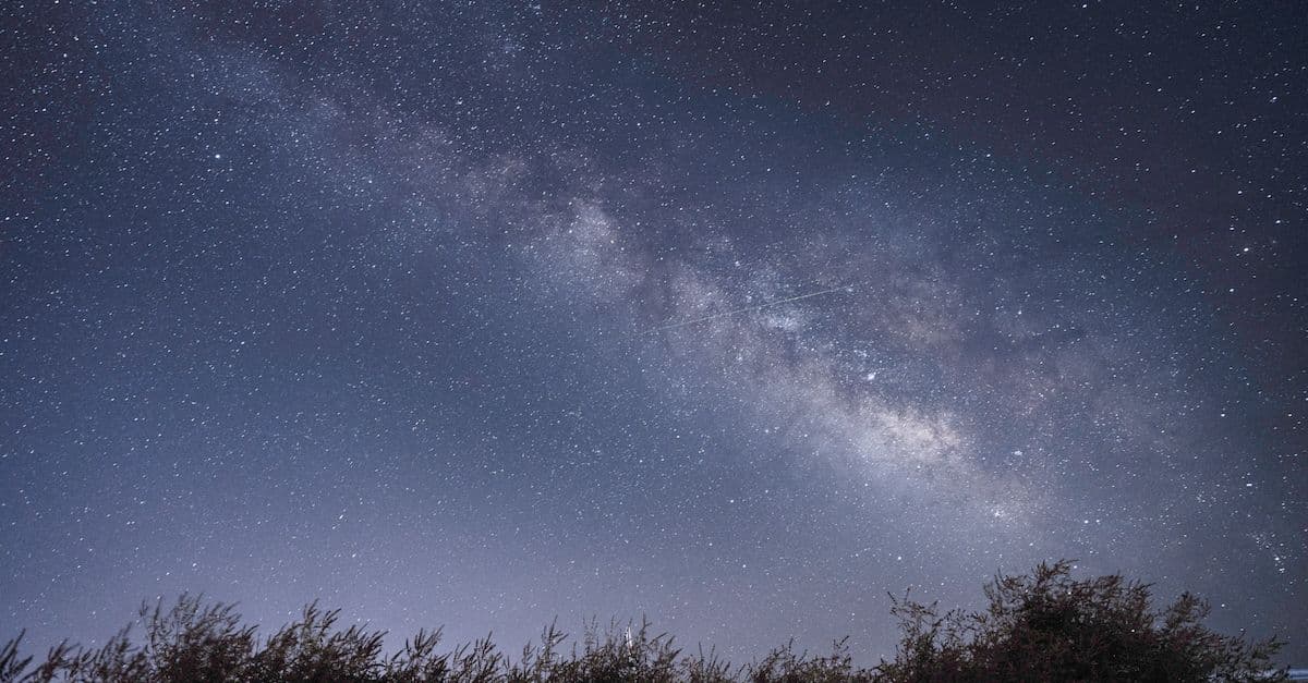 A stunning view of the Milky Way galaxy extending across the starry night sky above İzmir, Türkiye.