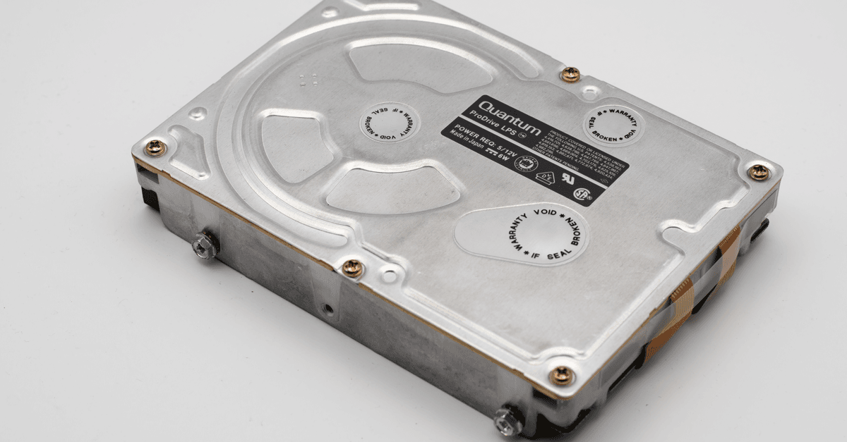 Retro Quantum ProDrive hard disk drive on a light background, showcasing vintage computer technology.