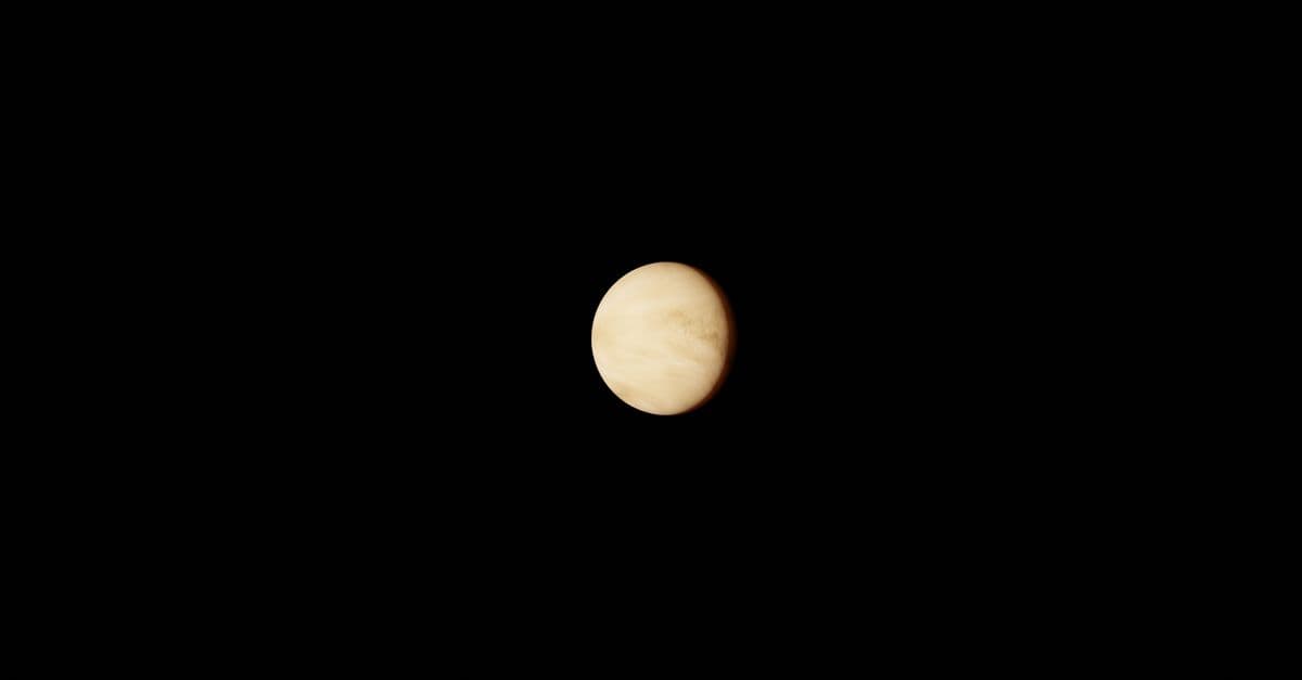 Image of planet Venus against a black space background, highlighting its atmospheric details.
