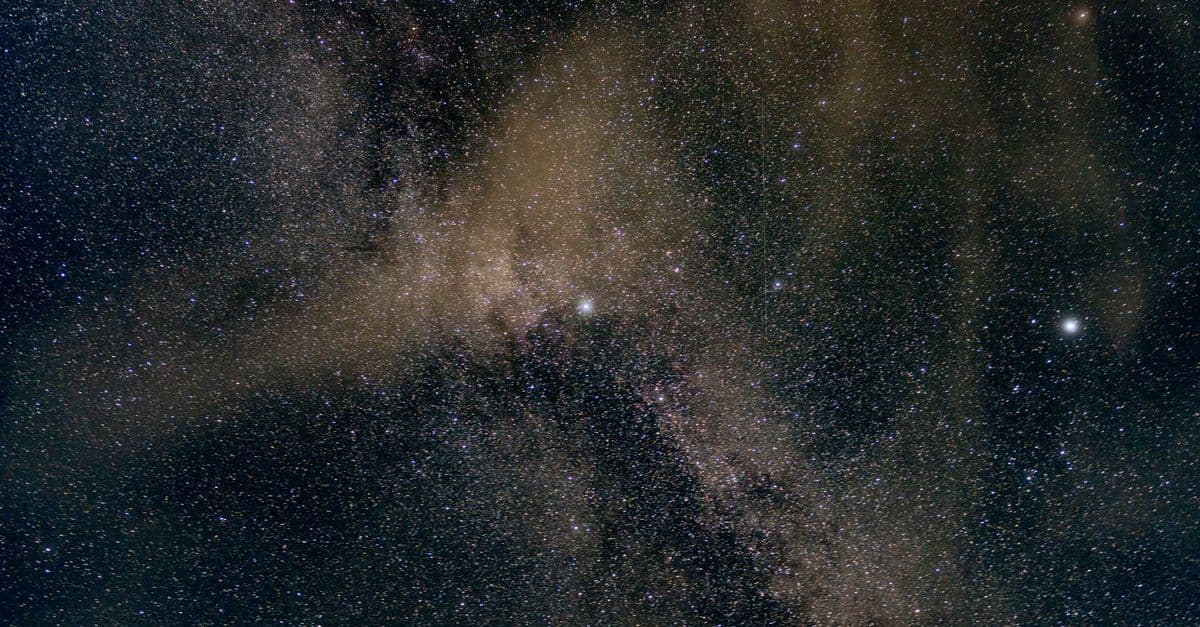 A breathtaking view of the night sky, showcasing an array of distant stars and galaxies.