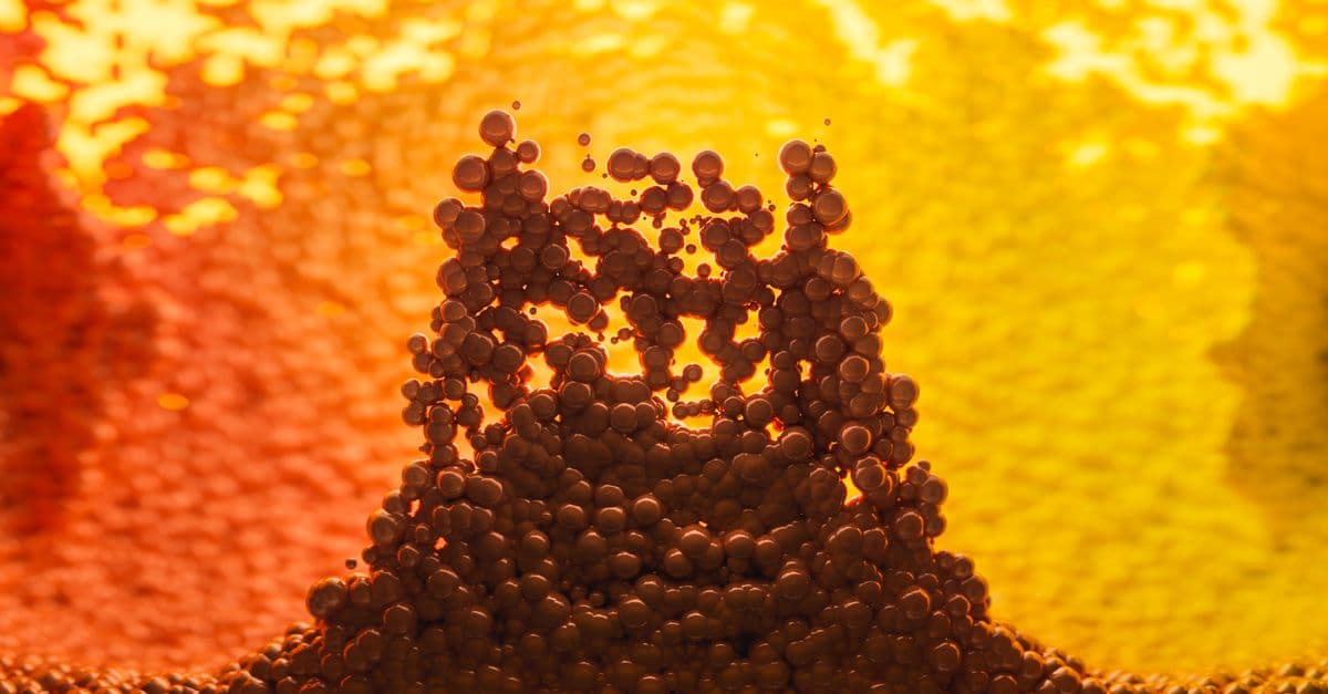 Dynamic abstract 3D render featuring molecules with vibrant yellow and orange colors, suggesting energy and motion.