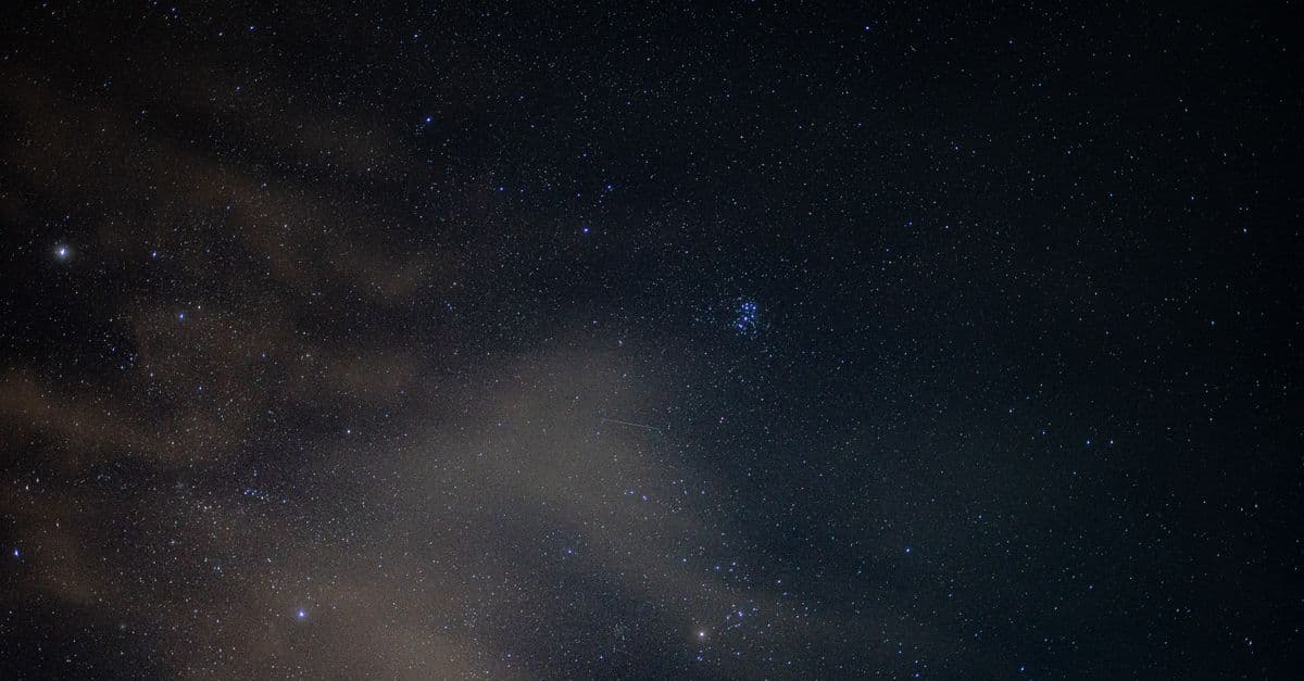 Beautiful night sky with constellations and stars shining brightly.