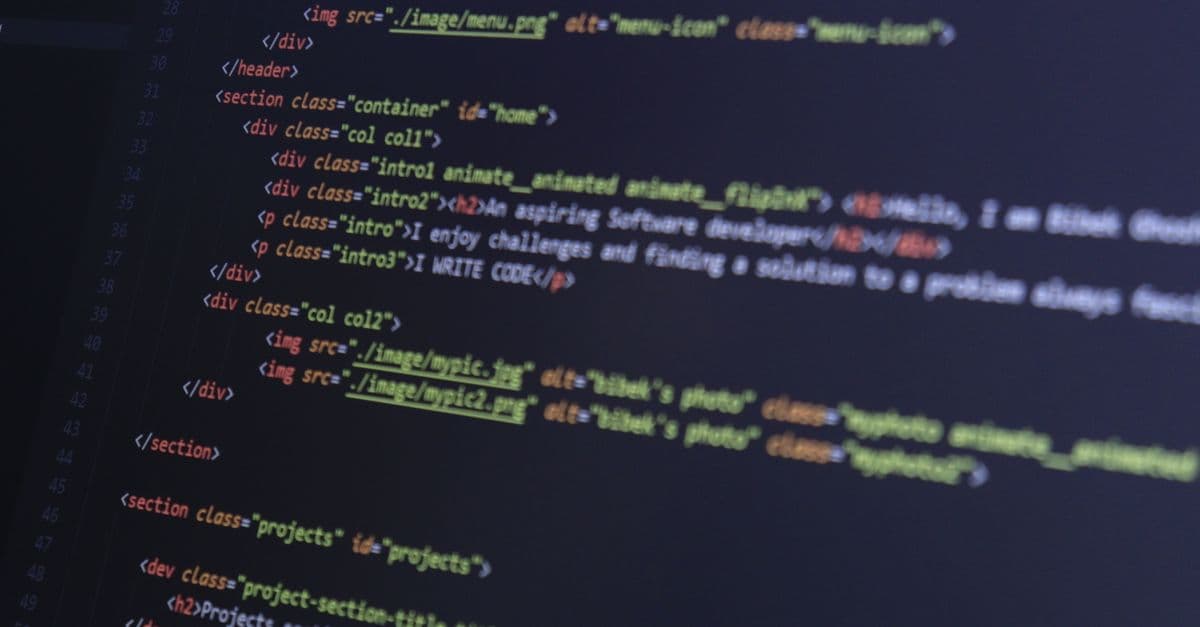 HTML and CSS code on a computer monitor, highlighting web development and programming.