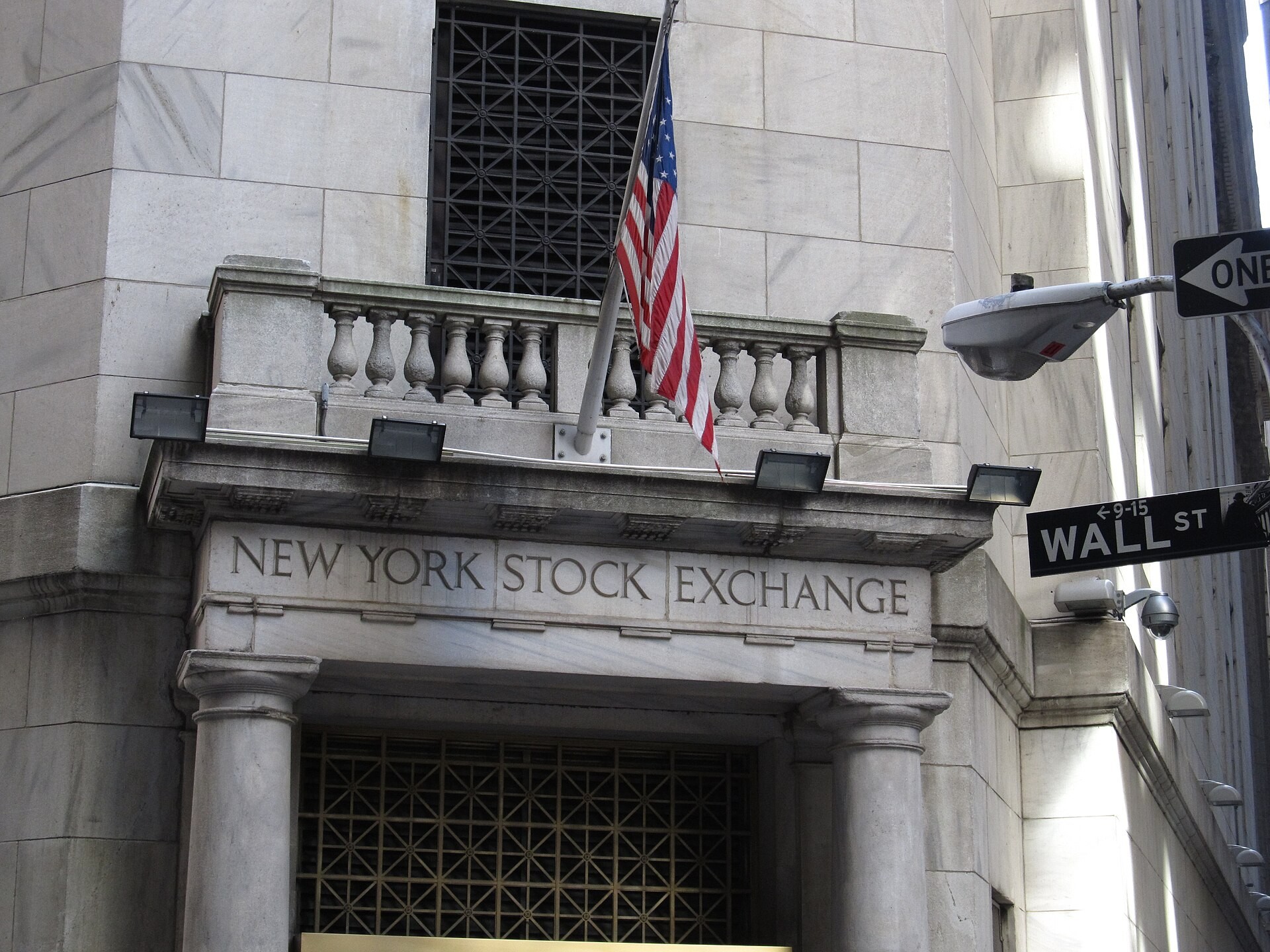 The New York Stock Exchange building on Wall Street, representing financial markets and institutions.